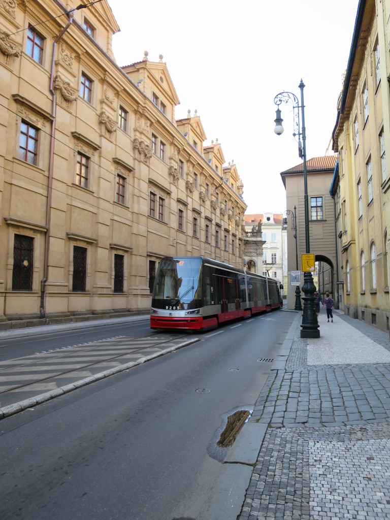 tram running down a Prague street